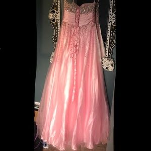 This is a Prom dress that is light pink,